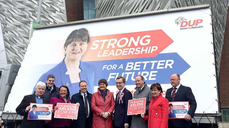 DUP leader Arlene Foster (centre) stands with with party colleagues during her party's election billboard launch outside Titanic Belfast, as the DUP leader has rejected Fianna Fail leader Micheal Martin's criticism of the Stormont Executive, branding it offensive and unjustified&nbsp;