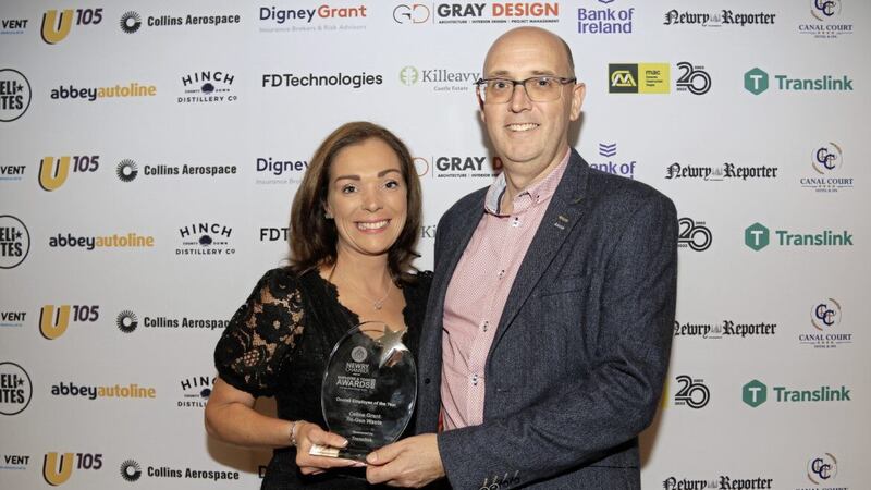 The overall Employee of the Year Award is presented to Celine Grant, commercial director at Re-Gen Waste, by Ruairi Savage, head of renewals at category sponsor Translink 