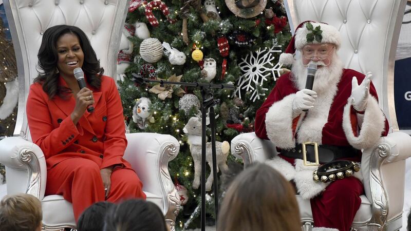 The former US first lady made a surprise visit to Children’s Hospital Colorado, along with Santa Claus.