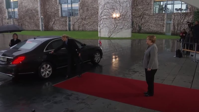 The Prime Minister was briefly stuck inside her car as she went to meet with the German Chancellor in Berlin.