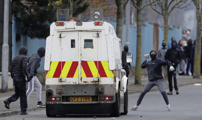 Youths throwing missiles during further unrest on the Shankill Road in west Belfast. Picture by Niall Carson, Press Association 