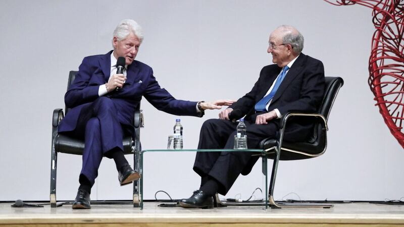 Former US President Bill Clinton and Senator George Mitchell, pictured at an event to mark the 20th anniversary of the Good Friday Agreement at Queen&#39;s University in Belfast in 2018. It is arguable that without US support, agreement would not have been reached. Picture by Brian Lawless/PA Wire 