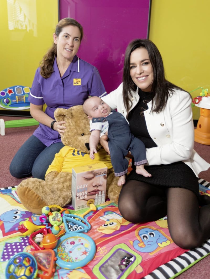 Helen Marks, TinyLife Family Support Officer and Joanna Gardiner, CEO of Elave with baby Ben Hall announcing a partnership with specialist skincare brand Elave Baby 