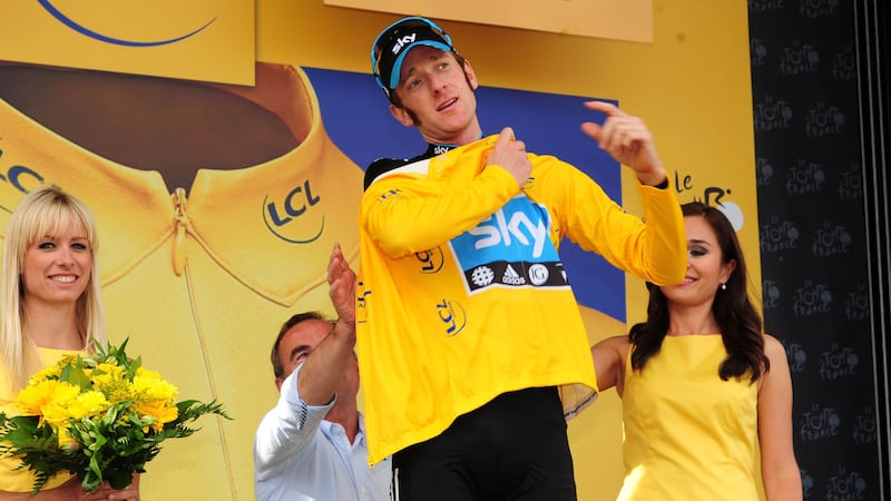 Bradley Wiggins of Sky Pro Cycling puts on the Yellow Jersey after winning Stage 19 - Tour De France - between Bonneval and Chartres, 2012&nbsp;