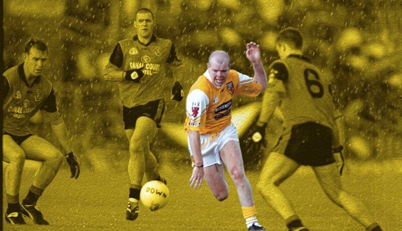 Antrim captain Anto Finnegan in a race for the ball with Down&#39;s Paul Higgins, Gregory McCartan and Paul Shields in the Ulster Championship match at Casement Park, Belfast on Sunday May 29 2000. Picture by Ann McManus. 