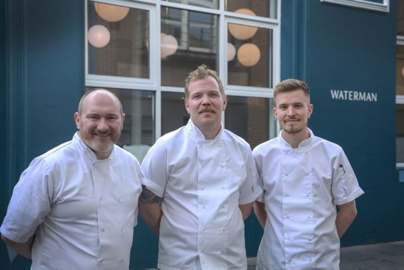Niall McKenna (left) with Cathal Duncan (centre), Waterman House Cookery School chef, and Aaron McNeice (right), new head chef at Waterman.
