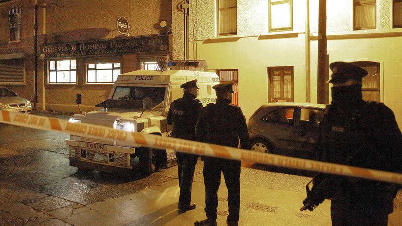 Police at the scene of the double shooting at the Grosvenor Homing Pigeon Club in west Belfast, where two men were shot in the legs. Picture by Cliff Donaldson. 