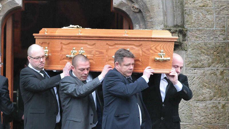 The coffin of Anthony McErlain (48) is carried from St Patrick's and St Brigid's Church in Ballycastle. Picture by Margaret McLaughlin