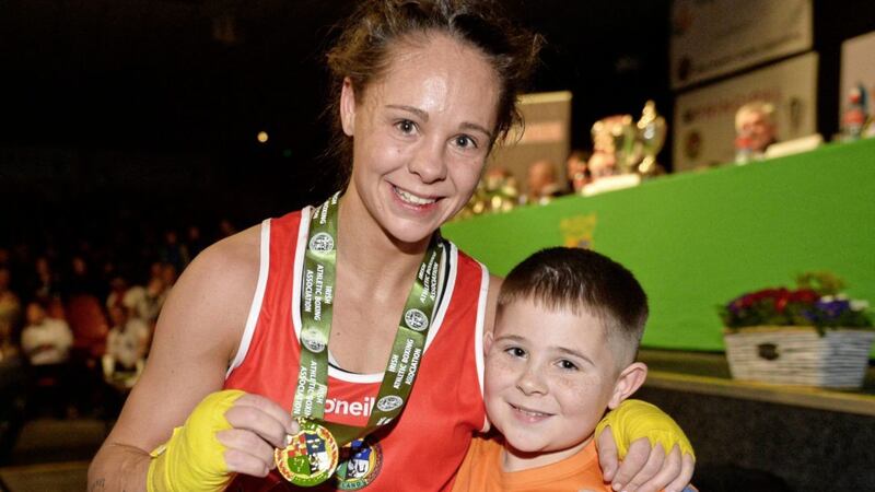 Carly McNaul with son Jaden after winning the flyweight title at the 2019 Irish Elite Championships. The Belfast woman has been called into the Ireland team for next month&#39;s European Olympic qualifier in London. Picture by Mark Marlow 
