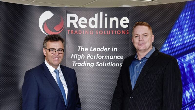 Alastair Hamilton, Invest NI, pictured with Rob McCollum, Redline Trading Solutions. The company has chosen Belfast as the location for a new global support centre creating up to 20 jobs 
