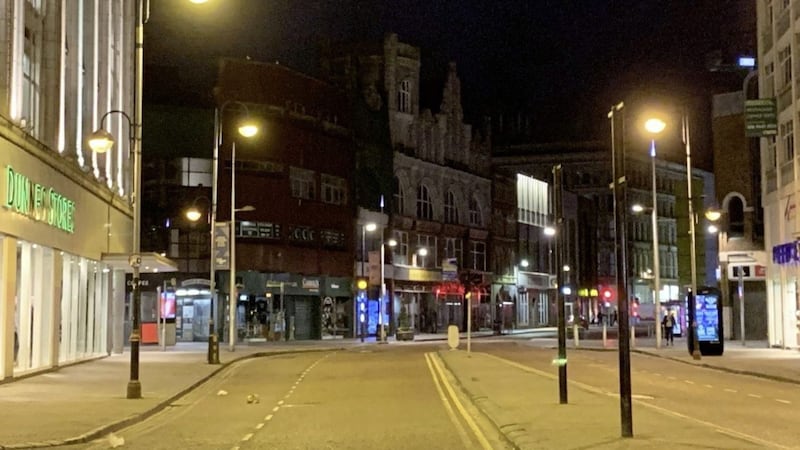 Belfast&#39;s High Street on a Saturday night deserted in response to the Covid-19 threat and the enforced closure of pubs,clubs and restaurants. Picture by Alan Lewis- Photopress Belfast 