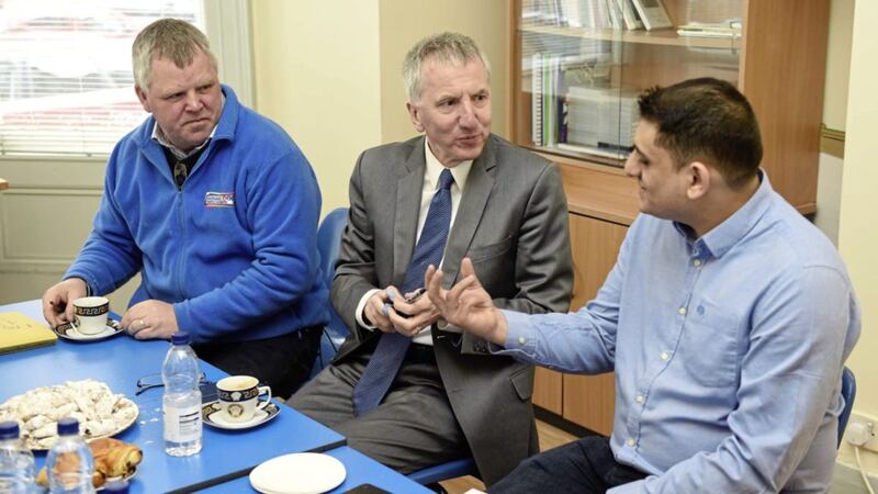 Sinn F&eacute;in&#39;s M&aacute;irt&iacute;n &Oacute; Muilleoir visits the Roma and Romanian Association of NI at their community centre in Belfast yesterday. Pictured are Gerard Rice, Mr &Oacute; Muilleoir and Abel Emanuel Nicola. Picture by Mark Marlow 