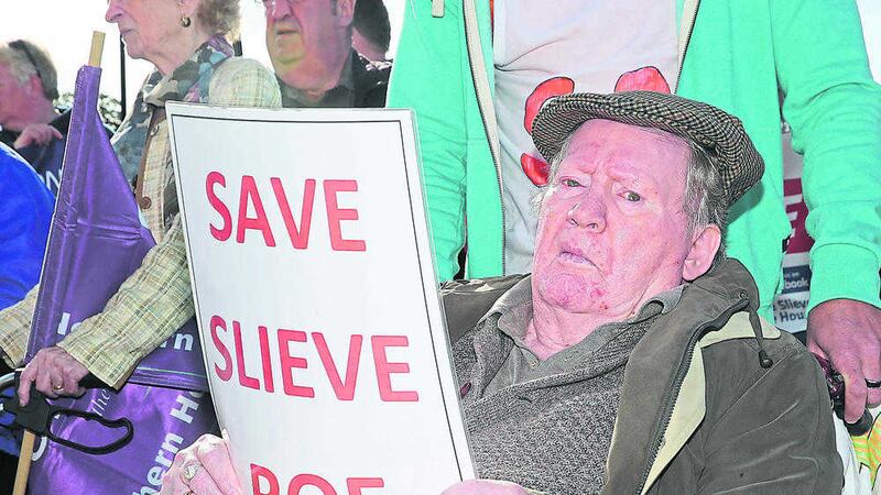 79-year-old Bill Larkam at the Unison protest at Stormont yesterday over cuts to NHS-run residential homes. Picture by Hugh Russell 