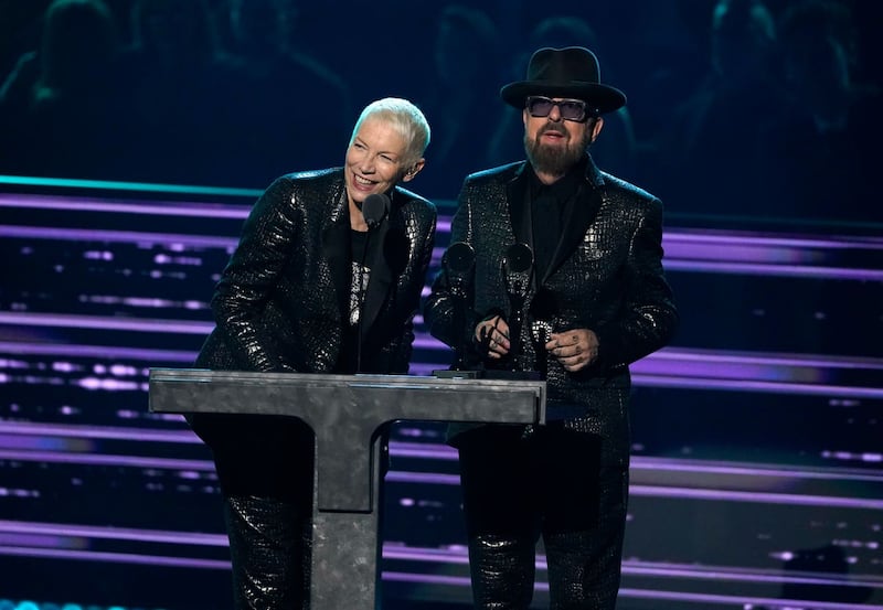 Inductees Annie Lennox, left, and Dave Stewart of Eurythmics speak during the Rock & Roll Hall of Fame Induction Ceremony at the Microsoft Theatre in Los Angeles
