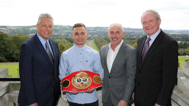 Peter Robinson and Martin McGuinness with boxer Carl Frampton and Barry McGuigan at parliament buildings 