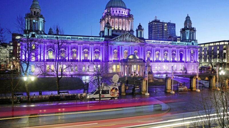 Belfast city hall lit up green, purple and white to mark the centenary of women's suffrage. Picture by Mal McCann