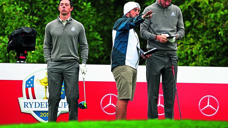 Rory McIlroy and Chris Wood during yesterday&rsquo;s practice round