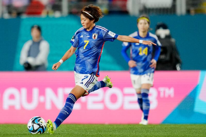 Hinata Miyazawa strikes the ball in Japan's defeat to Sweden