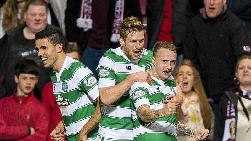 Celtic's Leigh Griffiths (right) celebrates after opening the scoring against Hearts at Tynecastle on Wednesday night<br />Picture: PA