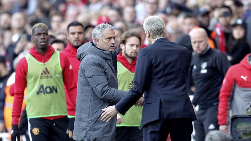 Jose Mourinho shakes hands with Arsenal boss Arsene Wenger at the end of Sunday&#39;s Premier League clash at the Emirates Stadium Picture by PA 