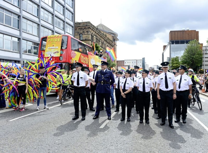 Pacemaker Press Belfast 04-08-2018: The Belfast Pride parade 2018 starts and finishes at Custom House Square in Belfast. Rainbow flags, face paint, fancy dress and brightly coloured floats will create a riot of colour on the streets of Belfast on Saturday. PSNI pictured taking part in the Parade..Picture By: Arthur Allison.. 
