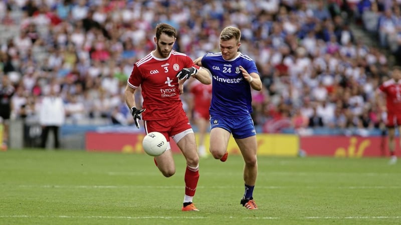 12/8/2018   Tyrones  Ronan Mc Namee   comes under pressure fgrom Monaghans  Conor Mc Carthy.   in yesterdays semi final game at Croke Park   Picture  Seamus Loughran 