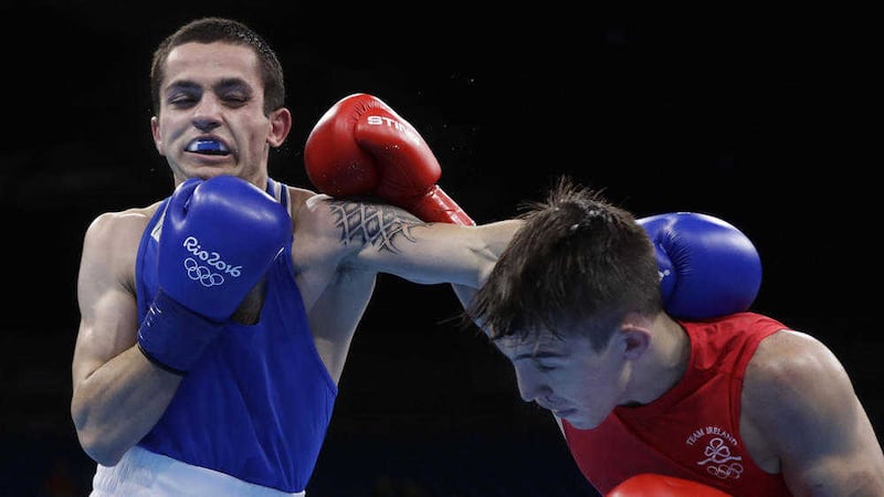 Belfast boxer Michael Conlan exchanges punches with Armenia's Aram Avagyan during their Olympic bout in Rio. Picture by AP Photo/Frank Franklin II