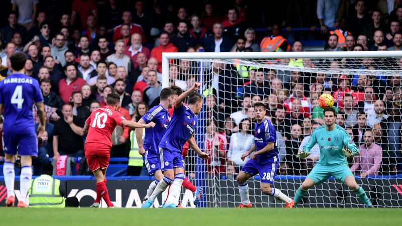 <span style="font-family: Verdana, Arial, Helvetica, sans-serif; font-size: 13.3333px;">Liverpool's Philippe Coutinho scores his side's second goal of the game against Chelsea</span>