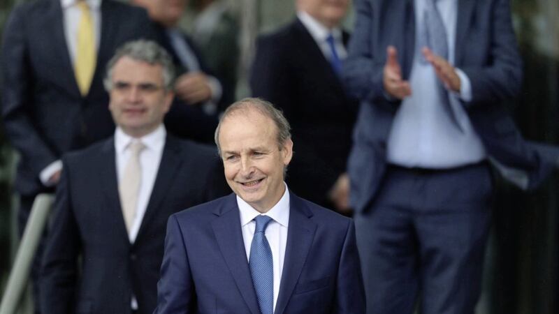 Fianna F&aacute;il leader Miche&aacute;l Martin leaves the D&aacute;il sitting in the Convention Centre in Dublin after being elected taoiseach. Picture by Niall Carson/PA Wire 