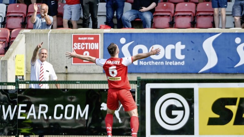 Cliftonville&#39;s Jamie Harney celebrates the first of his two goals against Carrick Rangers on Saturday Picture by Andrew McCarroll/Pacemaker 