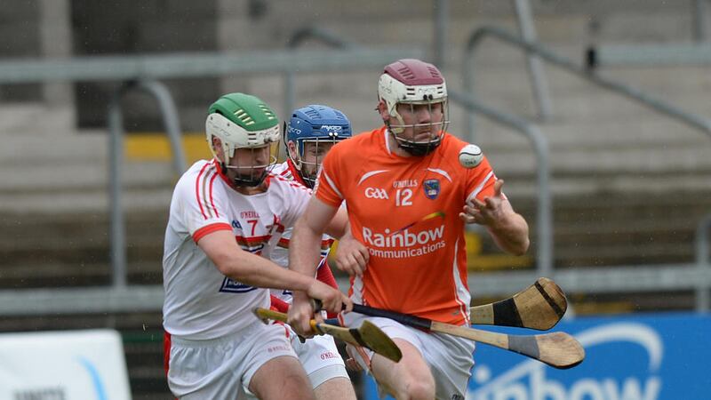 Eoin McGuinness of Armagh is pursued by Louth&#39;s Cathal Ryan 