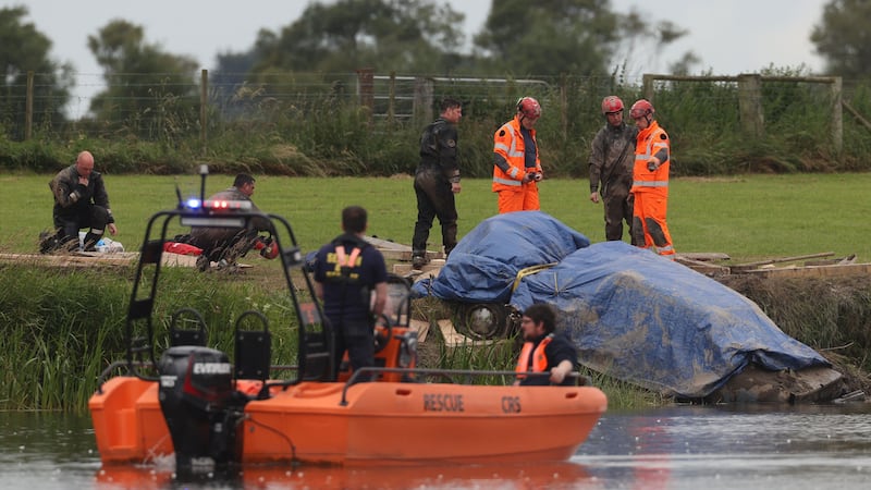 Emergency workers recover a Ford Orion, from the River Bann, at the New Ferry Road in Bellaghy last month. It has now been confirmed it belonged to James Patterson, whose body has been recovered. Picture by Liam McBurney/PA Wire
