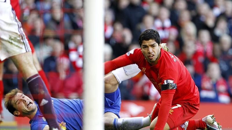Luis Suarez was handed a 10 match ban for biting Ivanovic
