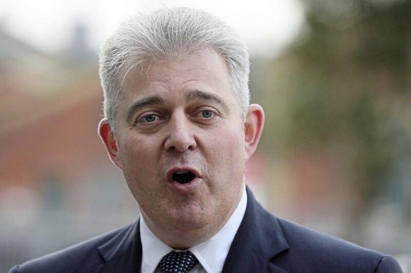 Lewis to be challenged over 'failure' to implement Stormont House agreement