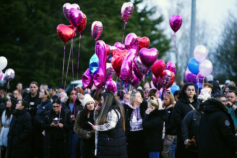 Balloons are released during a vigil to remember those who died (Ben Birchall/PA)