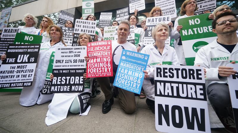 TV presenter and environmentalist Chris Packham with scientists protesting in central London in response to the State of Nature report last September