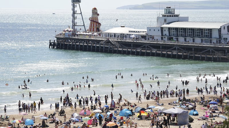 People enjoying the weather on Bournemouth beach
