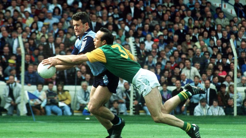 &nbsp;Vinny Murphy of Dublin is challenged by Meath&rsquo;s Mick Lyons during the epic Leinster Championship saga in 1991<br />Picture by Sportsfile