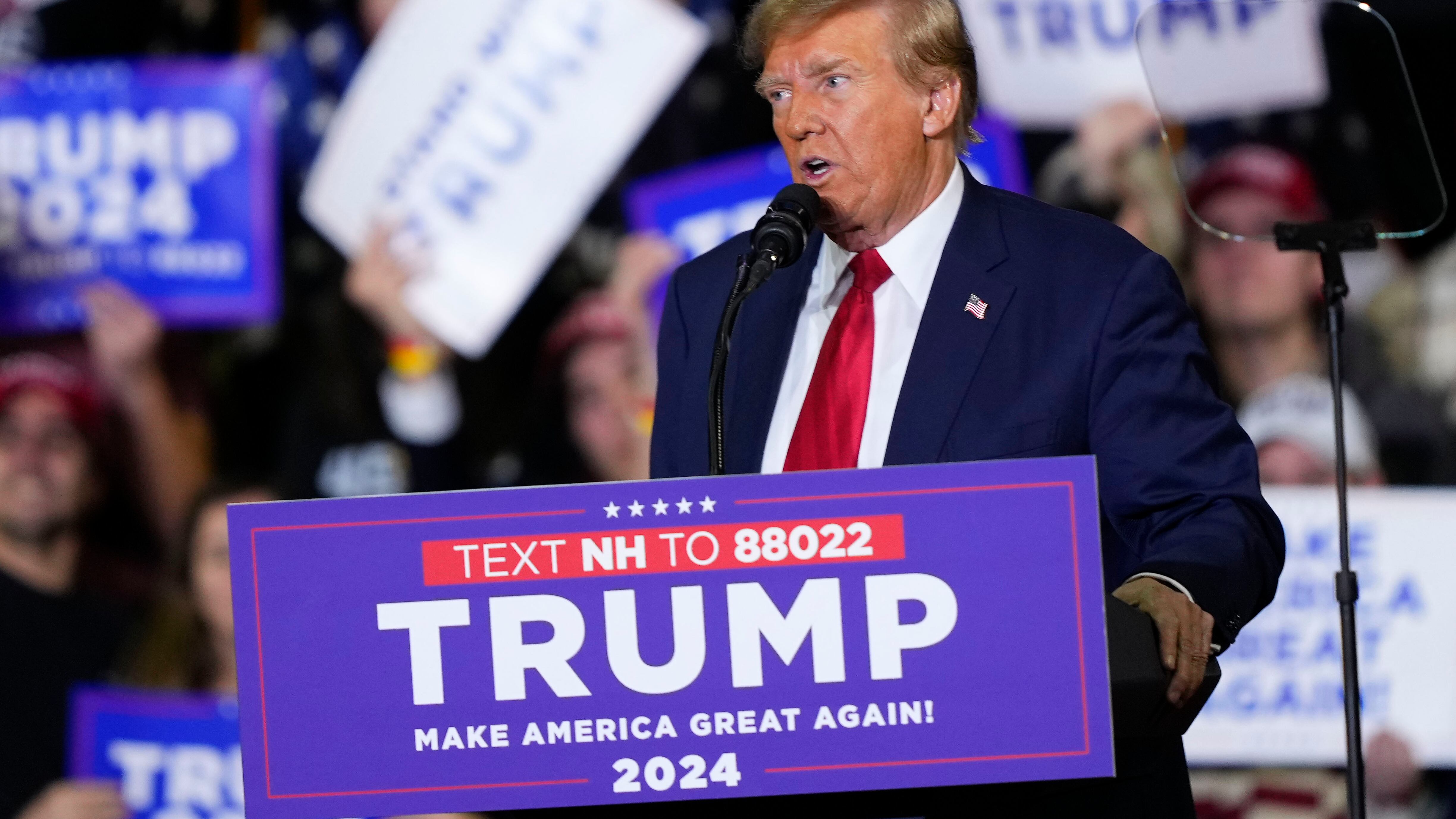 Former President Donald Trump speaks during a campaign event in Manchester, New Hampshire (Matt Rourke/AP)