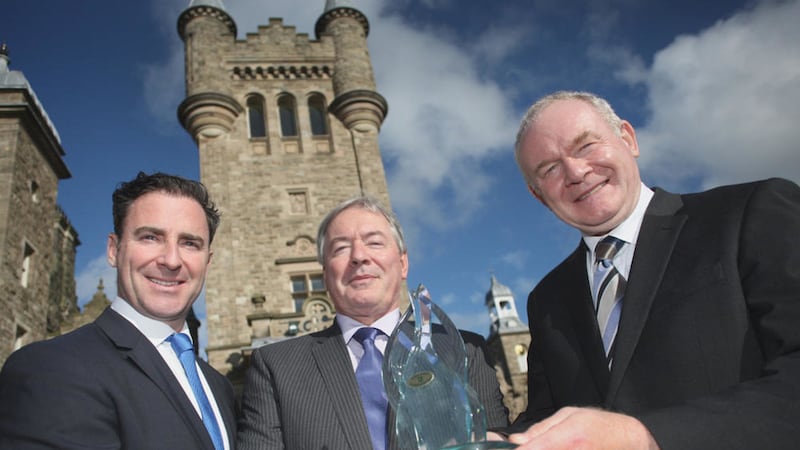 Jim Clerkin is presented with the Spirit of the Diaspora award by Deputy First Minister Martin McGuinness and NI Connections chief executive Andrew Cowan 