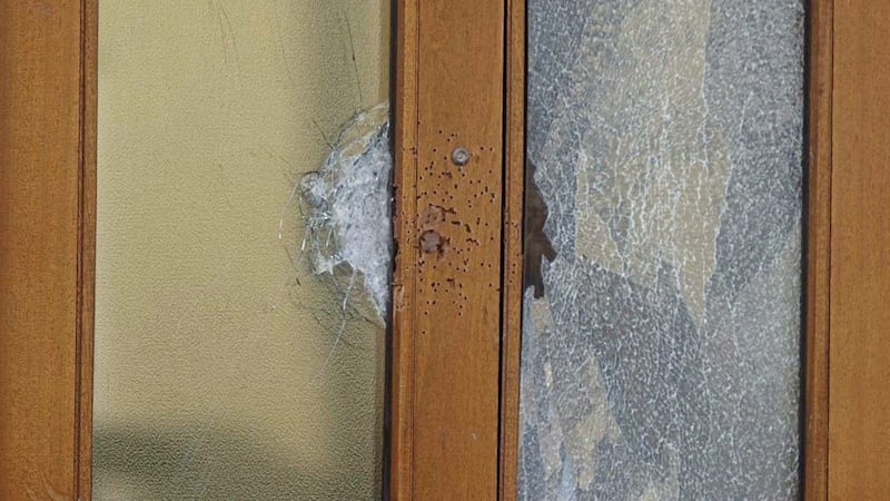 Damage to the front door of a house in the Torrens Road area of north Belfast 