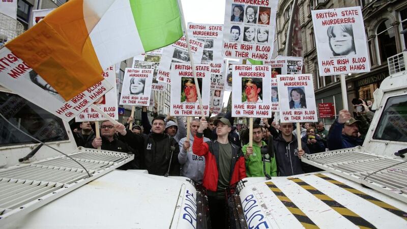 Republican group Saoradh and relatives of people killed by the British army protest at a military veterans rally at Belfast City Hall. Picture by Mal McCann 