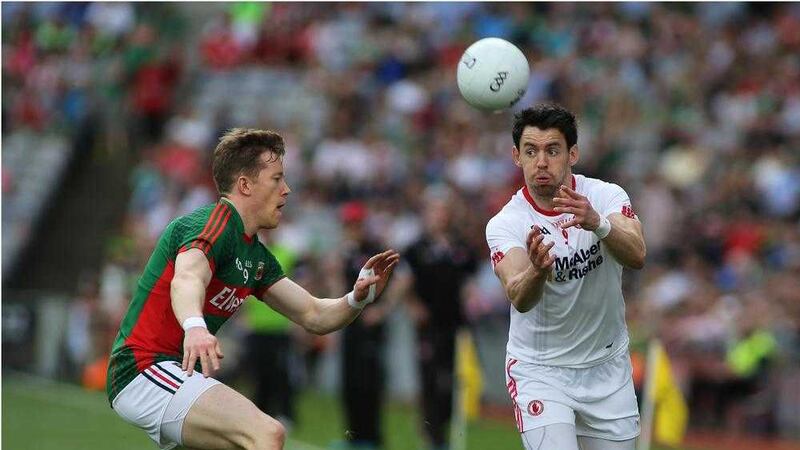 Tyrone&rsquo;s Mattie Donnelly (right) is nominated at midfield, alongside county colleague Colm Cavanagh &nbsp;