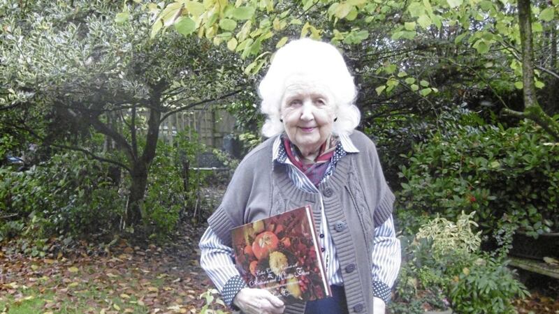 Sandra Carson with Autumn and Winter Flora, her book on flower arranging 