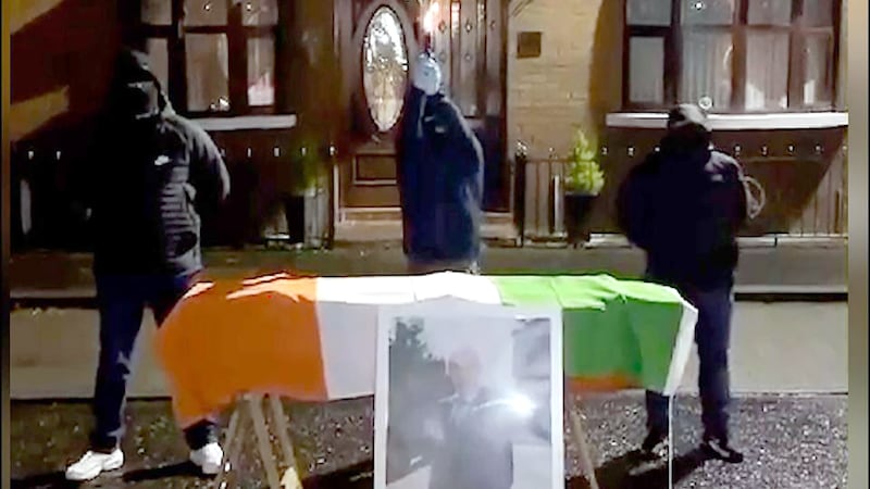 PACEMAKER BELFAST  04/04/2024
Masked men fired shots over the coffin of IRA hitman Gerard Hucker Moyna ahead of his funeral today.
Moyna, linked to several murders  including Shankill Butcher Lenny Murphy  died last month aged 69.