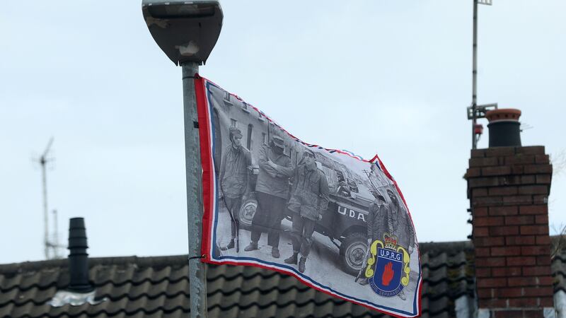 UDA and UVF flags erected in a Lurgan estate where a young Catholic mother faced sectarian abuse in her own home earlier this year. 