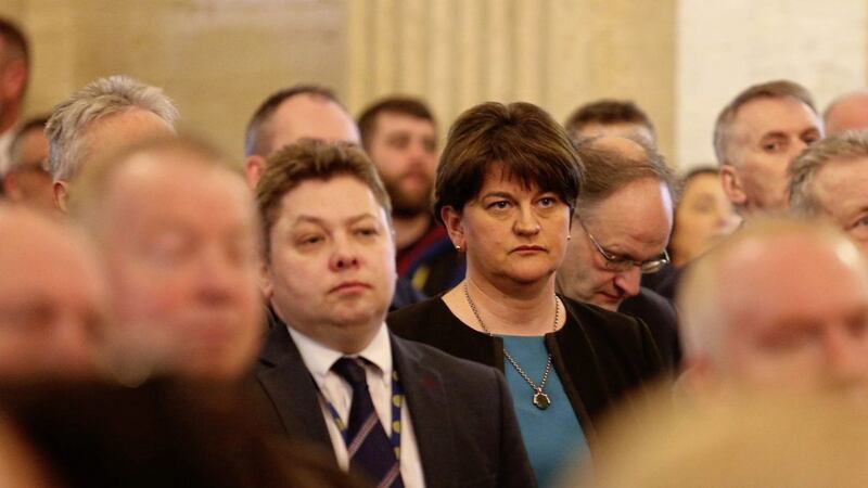 DUP leader Arlene Foster with party chief executive Timothy Johnston, left. Picture by Mal McCann 