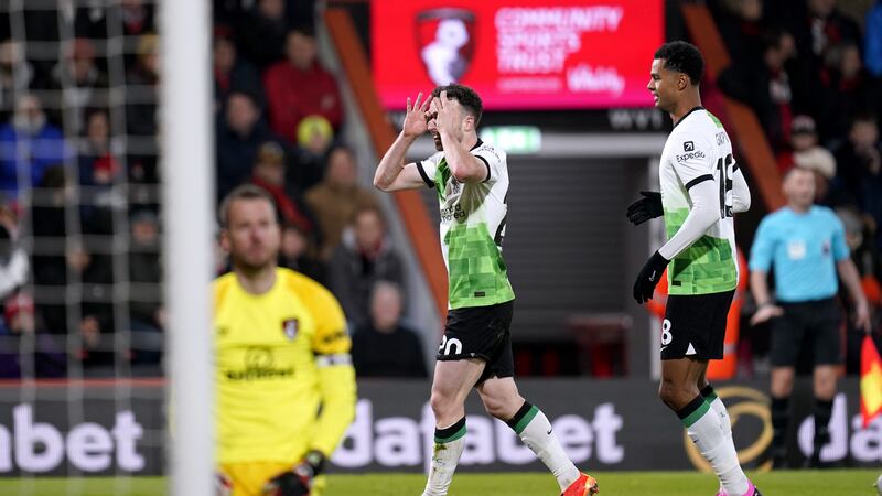 Diogo Jota (centre) scored twice to help Liverpool to victory over Bournemouth