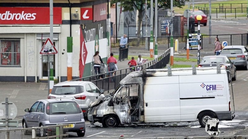 The scene in the Bogside area of Derry after a van was hijacked and burnt out at the bottom of the Lecky fly-over in Derry yesterday. Picture by Margaret McLaughlin 