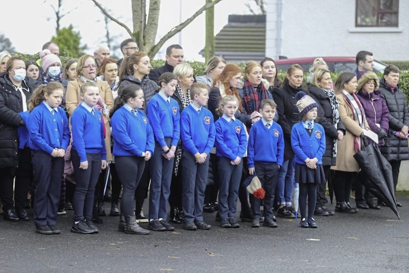 Pupils waiting before the funeral of Francis Lagan, principal of St Mary&#39;s Primary School in Maghera. Picture By Hugh Russell 